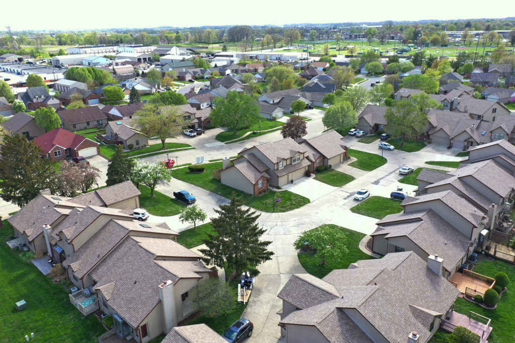 Aerial view of HOA properties after roofing installation - Big Boy&#039;s Construction