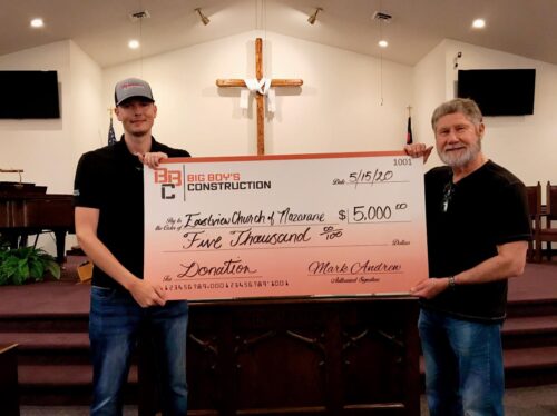 Big Boy's Construction donating to a church.
