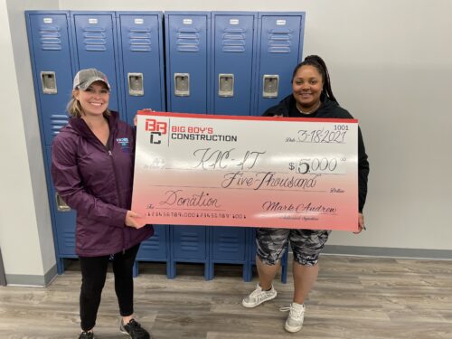 Big Boy's Construction donating to a school.