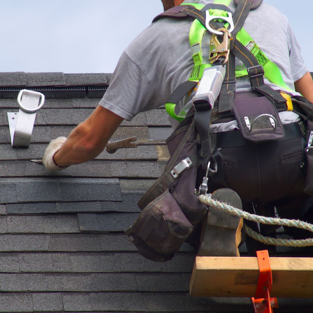 BlitzTitle-1080x1080-image4 Roofer doing repairs