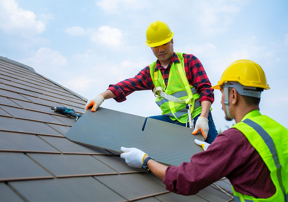 Image 3 workers doing roof replacement