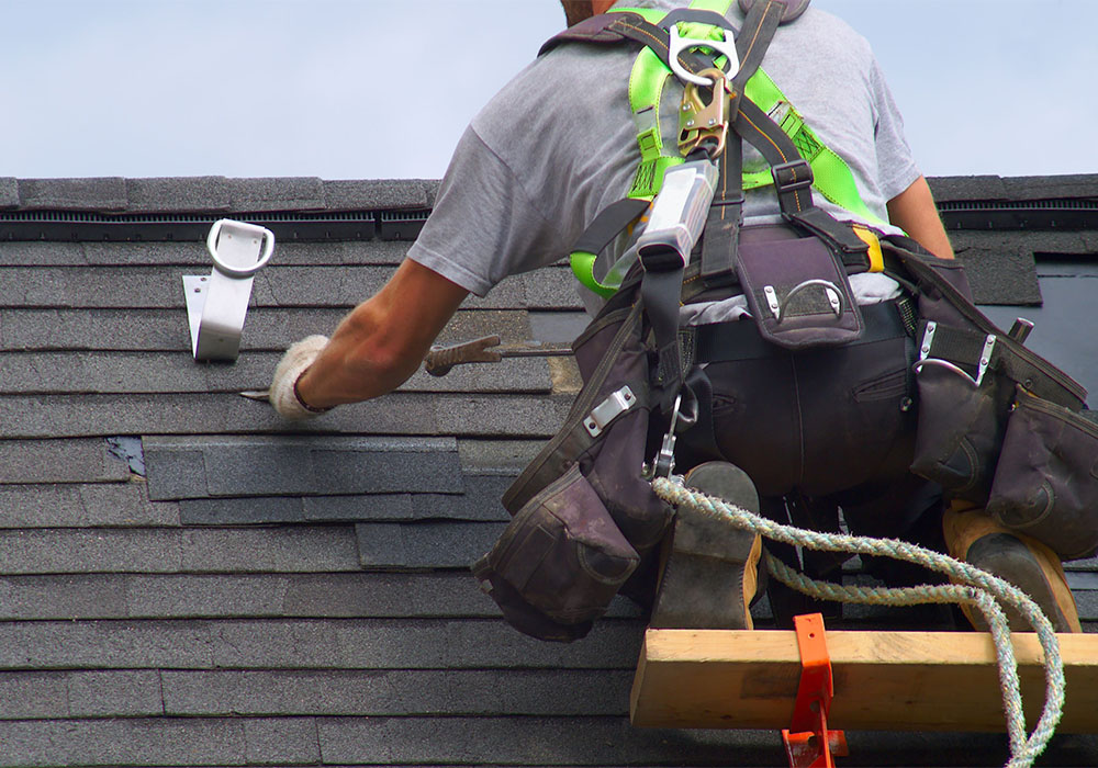 Image 4 contractor repairing roof