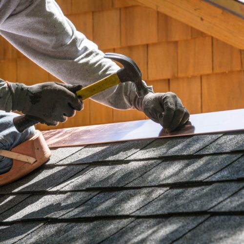 roofer fixing flashing