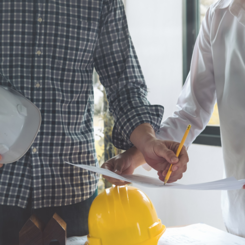 A contractor talking with a client